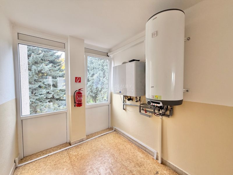 Spacious 4-Room Apartment with Garden and Garage in Martin
